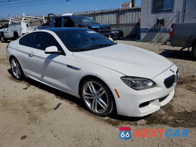 Czwarte zdjęcie samochodu z boku: 2015 BMW 640 I VIN:WBALW3C53FC893077 - miniatura