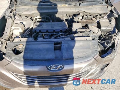 Zdjęcie 12 z 14 samochodu: 2011 HYUNDAI TUCSON GLS VIN:KM8JU3AC8BU173940 - miniatura