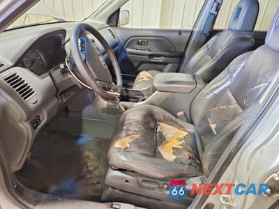 Zdjęcie 7 z 13 samochodu: 2003 HONDA PILOT EXL VIN:2HKYF185X3H509317 - miniatura