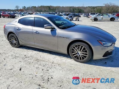 Czwarte zdjęcie samochodu z boku: 2016 MASERATI GHIBLI S VIN:ZAM57RTA6G1171524 - miniatura