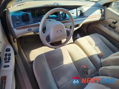Zdjęcie 8 z 13 samochodu: 2004 FORD CROWN VICTORIA LX VIN:2FAFP74W04X171468 - miniatura