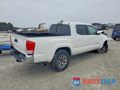 Trzecie zdjęcie samochodu z tyłu: 2017 TOYOTA TACOMA SR5 V6 VIN:3TMAZ5CN7HM044052 - miniatura