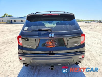 Zdjęcie 6 z 12 samochodu: 2019 HONDA PASSPORT EXL VIN:5FNYF8H51KB010590 - miniatura