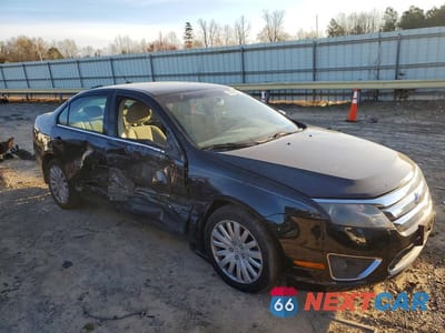 Czwarte zdjęcie samochodu z boku: 2010 FORD FUSION HYBRID VIN:3FADP0L32AR211422 - miniatura