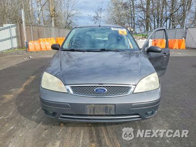 Piąte zdjęcie samochodu w środku: 2005 FORD FOCUS VIN:3FAFP37NX5R109880 - miniatura