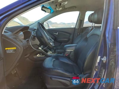 Zdjęcie 7 z 11 samochodu: 2011 HYUNDAI TUCSON GLS VIN:KM8JU3AC8BU155857 - miniatura