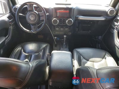 Zdjęcie 8 z 12 samochodu: 2018 JEEP WRANGLER UNLIMITED SAHARA VIN:1C4HJWEG5JL919145 - miniatura