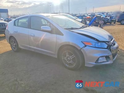 Czwarte zdjęcie samochodu z boku: 2012 HONDA INSIGHT LX VIN:JHMZE2H57CS001562 - miniatura