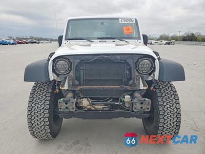 Piąte zdjęcie samochodu w środku: 2016 JEEP WRANGLER UNLIMITED RUBICON VIN:1C4BJWFG7GL291649 - miniatura