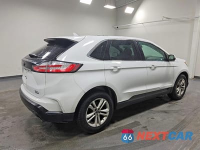 Trzecie zdjęcie samochodu z tyłu: 2019 FORD EDGE SEL VIN:2FMPK4J9XKBB38333 - miniatura