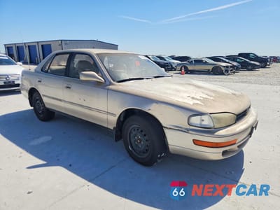 Czwarte zdjęcie samochodu z boku: 1993 TOYOTA CAMRY LE VIN:4T1SK12E2PU195678 - miniatura