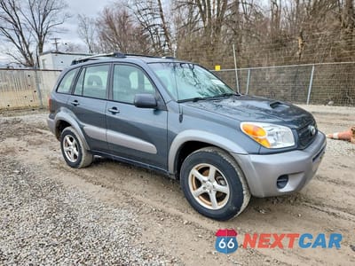 Czwarte zdjęcie samochodu z boku: 2004 TOYOTA RAV4 BASE VIN:JTEGD20VX40016430 - miniatura