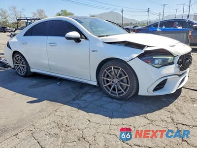 Czwarte zdjęcie samochodu z boku: 2021 MERCEDES BENZ CLA 45 AMG VIN:W1K5J5DBXMN131401 - miniatura