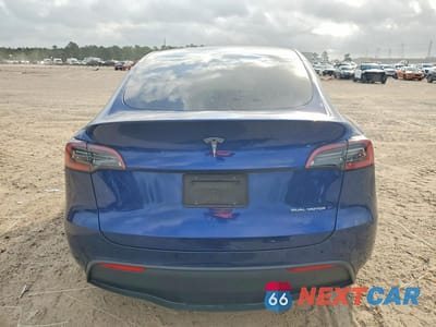 Zdjęcie 6 z 14 samochodu: 2023 TESLA MODEL Y VIN:7SAYGDEE7PF620188 - miniatura