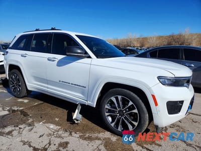 Czwarte zdjęcie samochodu z boku: 2023 JEEP GRAND CHEROKEE OVERLAND 4XE VIN:1C4RJYD64P8785569 - miniatura