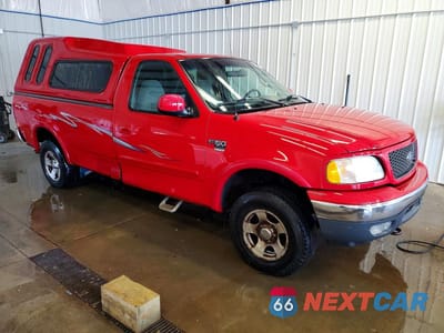Czwarte zdjęcie samochodu z boku: 2001 FORD F150 VIN:1FTRF18W21NA48964 - miniatura