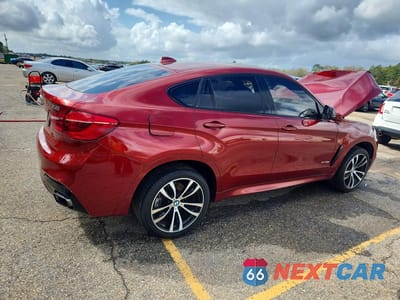 Trzecie zdjęcie samochodu z tyłu: 2015 BMW X6 XDRIVE50I VIN:5UXKU6C5XF0F94226 - miniatura