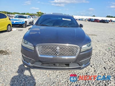 Piąte zdjęcie samochodu w środku: 2017 LINCOLN MKZ PREMIERE VIN:3LN6L5A91HR633836 - miniatura