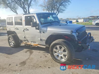 Czwarte zdjęcie samochodu z boku: 2013 JEEP WRANGLER UNLIMITED SAHARA VIN:1C4BJWEGXDL609924 - miniatura