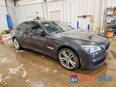 Czwarte zdjęcie samochodu z boku: 2014 BMW 750 LI VIN:WBAYE8C53ED135609 - miniatura
