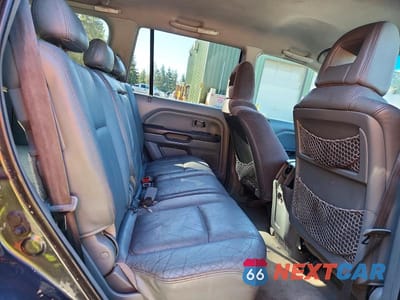 Zdjęcie 11 z 14 samochodu: 2004 HONDA PILOT EXL VIN:2HKYF18764H609224 - miniatura