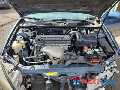 Zdjęcie 11 z 11 samochodu: 2004 TOYOTA CAMRY LE VIN:4T1BE32K64U789856 - miniatura