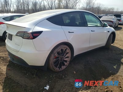 Trzecie zdjęcie samochodu z tyłu: 2022 TESLA MODEL Y VIN:7SAYGDEF4NF452435 - miniatura
