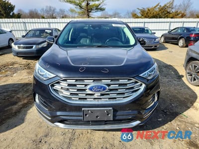 Piąte zdjęcie samochodu w środku: 2019 FORD EDGE TITANIUM VIN:2FMPK4K92KBB44691 - miniatura