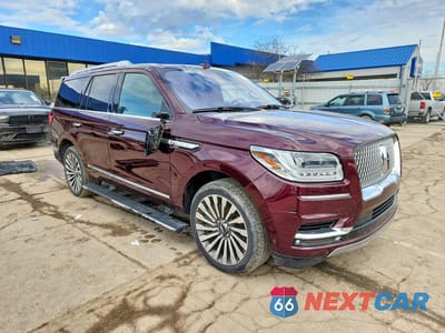 Czwarte zdjęcie samochodu z boku: 2019 LINCOLN NAVIGATOR RESERVE VIN:5LMJJ2LT4KEL03770 - miniatura