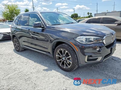 Czwarte zdjęcie samochodu z boku: 2014 BMW X5 XDRIVE35I VIN:5UXKR0C57E0H27893 - miniatura