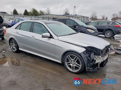 Czwarte zdjęcie samochodu z boku: 2016 MERCEDES-BENZ E 400 4MATIC VIN:WDDHF6HBXGB288592 - miniatura