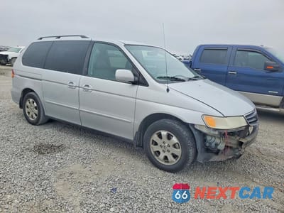 Czwarte zdjęcie samochodu z boku: 2002 HONDA ODYSSEY EXL VIN:2HKRL18952H515783 - miniatura