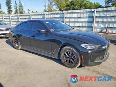Czwarte zdjęcie samochodu z boku: 2023 BMW I4 EDRIVE 35 VIN:WBY43AW05PFP68827 - miniatura