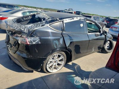 Trzecie zdjęcie samochodu z tyłu: 2024 TESLA MODEL Y VIN:7SAYGDEE1RA230834 - miniatura