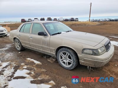 Czwarte zdjęcie samochodu z boku: 2004 FORD CROWN VICTORIA UNKNOWN VIN:2FAFP74W44X181727 - miniatura
