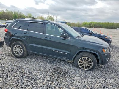 Czwarte zdjęcie samochodu z boku: 2014 JEEP GRAND CHEROKEE LAREDO VIN:1C4RJFAG6EC142877 - miniatura