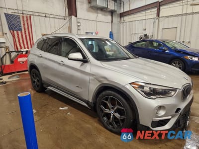 Czwarte zdjęcie samochodu z boku: 2016 BMW X1 XDRIVE28I VIN:WBXHT3C38G5E56512 - miniatura
