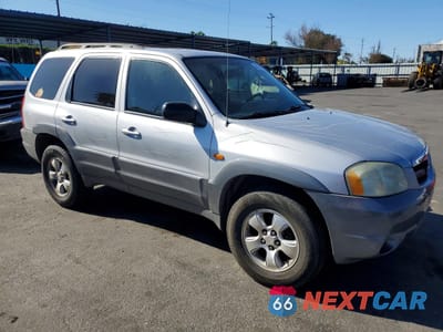 Czwarte zdjęcie samochodu z boku: 2001 MAZDA TRIBUTE LX VIN:4F2YU09151KM33063 - miniatura