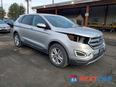 Czwarte zdjęcie samochodu z boku: 2015 FORD EDGE SEL VIN:2FMTK4J84FBC11692 - miniatura