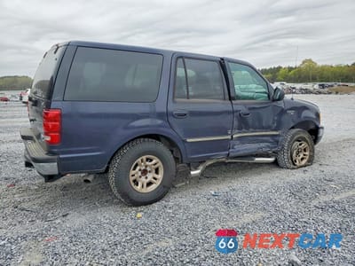 Trzecie zdjęcie samochodu z tyłu: 1999 FORD EXPEDITION VIN:1FMPU18L4XLB43416 - miniatura