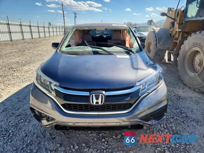 Piąte zdjęcie samochodu w środku: 2016 HONDA CR-V LX VIN:5J6RM4H36GL129574 - miniatura