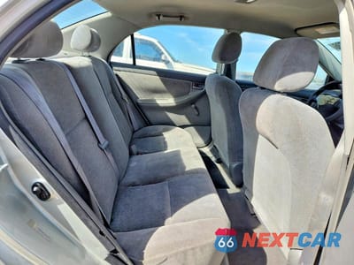 Zdjęcie 10 z 13 samochodu: 2004 TOYOTA COROLLA CE VIN:JTDBR32E742043382 - miniatura