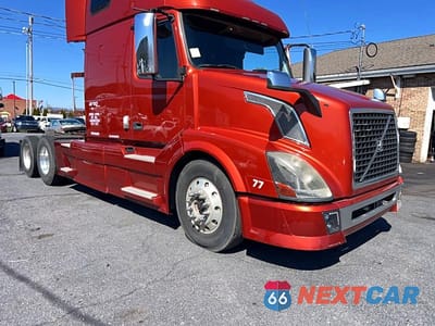 Zdjęcie 14 z 14 samochodu: 2014 VOLVO VNL TRUCKS SEMI TRUCK VIN:4V4NC9TJ6EN177222 - miniatura