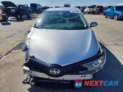 Piąte zdjęcie samochodu w środku: 2016 SCION IM BASE VIN:JTNKARJE9GJ520668 - miniatura