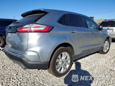 Trzecie zdjęcie samochodu z tyłu: 2023 FORD EDGE TITANIUM VIN:2FMPK4K92PBA39009 - miniatura
