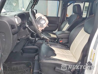 Zdjęcie 7 z 12 samochodu: 2017 JEEP WRANGLER UNLIMITED SAHARA VIN:1C4HJWEG3HL624863 - miniatura