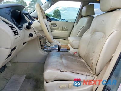 Zdjęcie 7 z 13 samochodu: 2011 INFINITI QX56 BASE VIN:JN8AZ2NF4B9500202 - miniatura