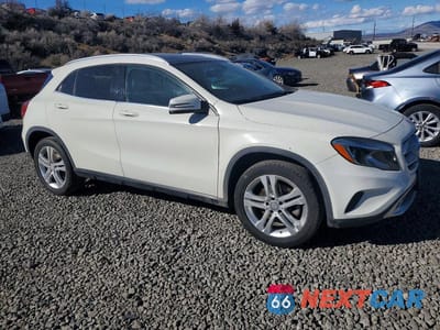 Czwarte zdjęcie samochodu z boku: 2015 MERCEDES-BENZ GLA 250 4MATIC VIN:WDCTG4GB0FJ039322 - miniatura