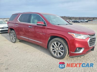 Czwarte zdjęcie samochodu z boku: 2018 CHEVROLET TRAVERSE PREMIER VIN:1GNEVJKW8JJ147233 - miniatura