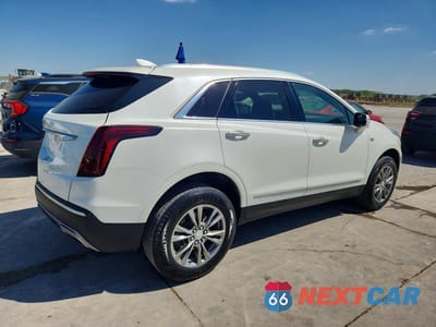 Trzecie zdjęcie samochodu z tyłu: 2021 CADILLAC XT5 PREMIUM LUXURY VIN:1GYKNCR45MZ108644 - miniatura